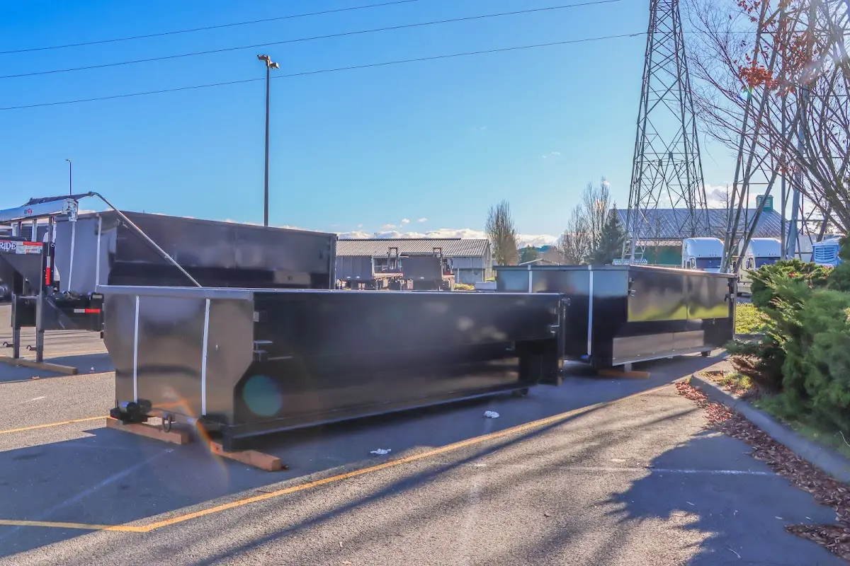 Roll-off dumpster ready for waste disposal at job site for Construction Dumpster Rental in West Jefferson